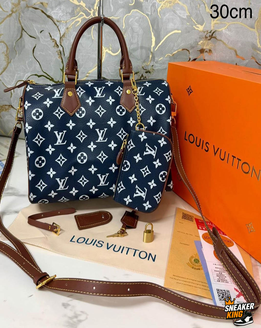 Set di borsa e pochette Louis Vuitton Speedy Bandoulière 30 con monogramma inverso bianco e blu navy e finiture in pelle marrone.